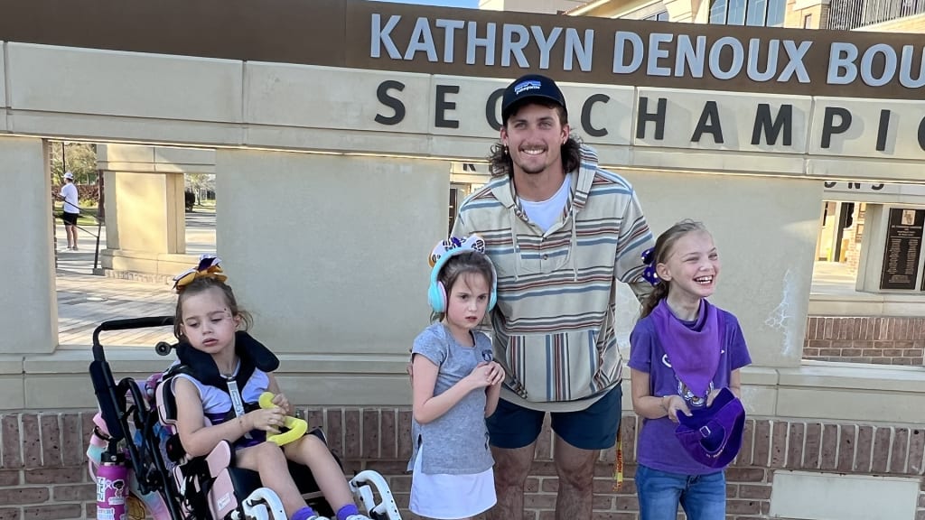 Dylan Crews spends time with some of his young fans.