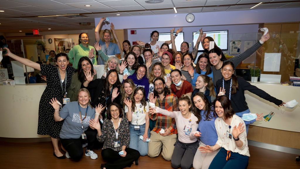 Singer-songwriter Noah Kahan visits with patients at the Jimmy Fund Clinic at the Dana-Farber Cancer Institute in Boston in 2024.