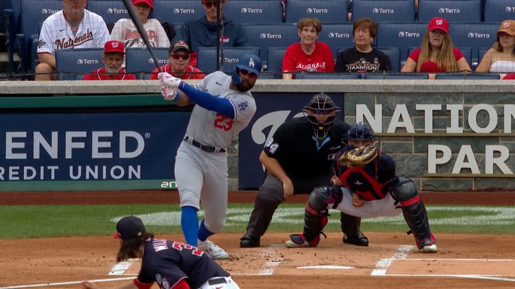 Dodgers endure long rain delay to earn win over Nats