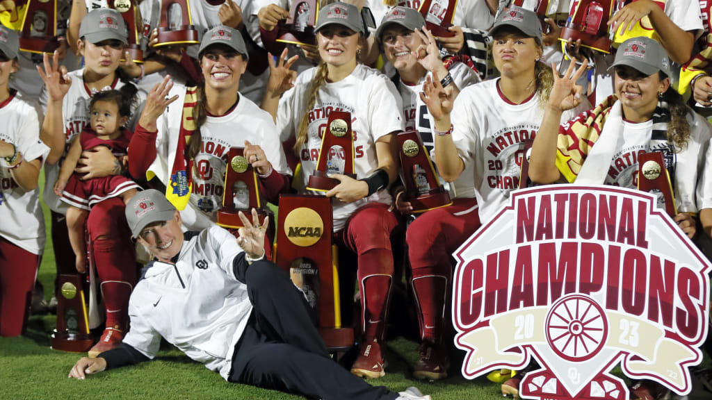 Patty Gasso celebrates with the Oklahoma Sooners after their third of four consecutive Women's College World Series titles in 2023.