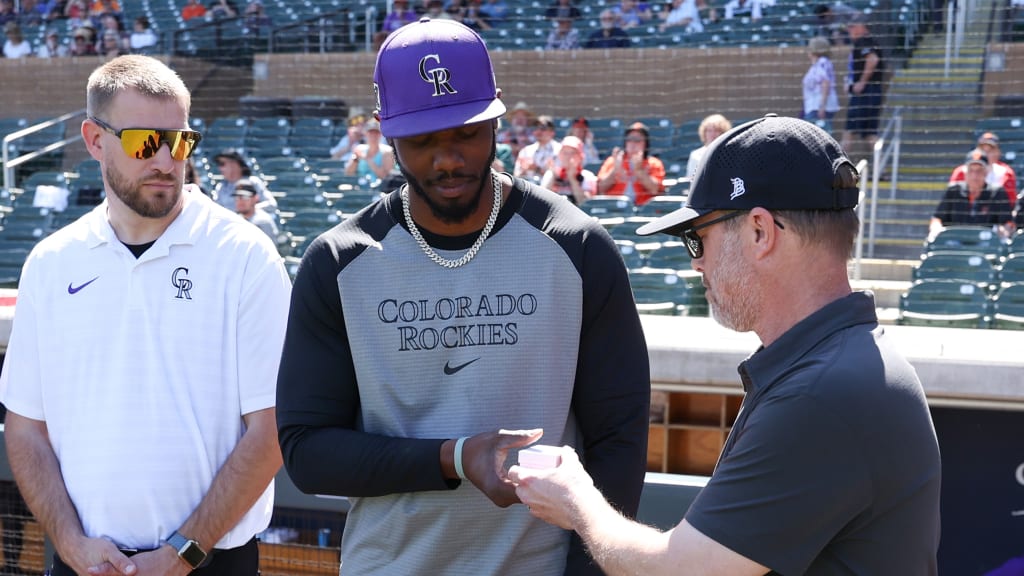Nic Wilson is presented with an Arizona Fall League championship ring in Spring Training. (photo via Getty Images)