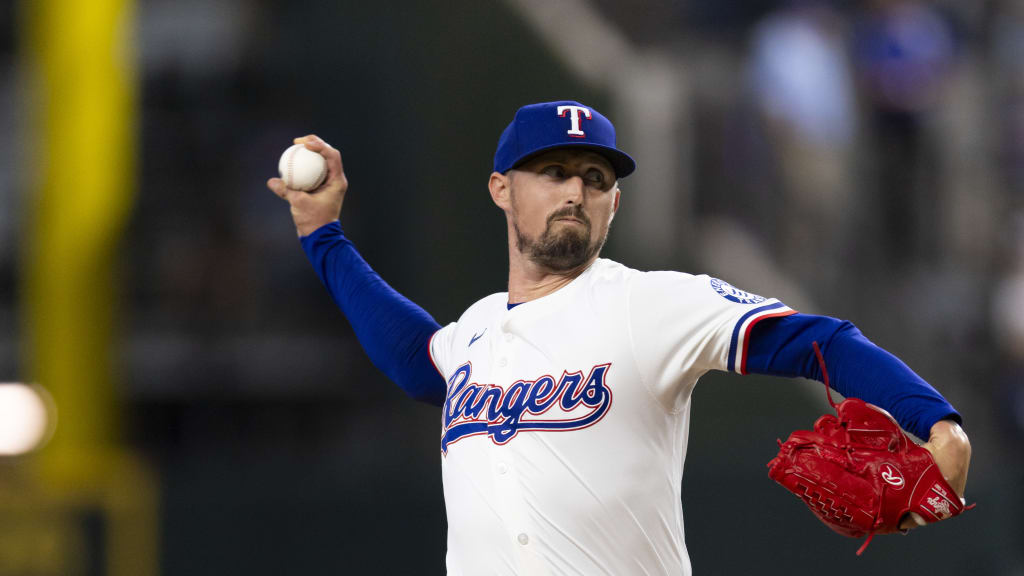 Rangers pitcher Shawn Armstrong delivers a pitch to home plate at Globe Life Field.