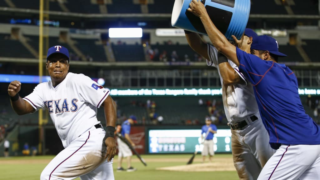 Adrian Beltré being chased by Rougned Odor and Martín Pérez after he hit for the cycle on Aug. 3, 2015