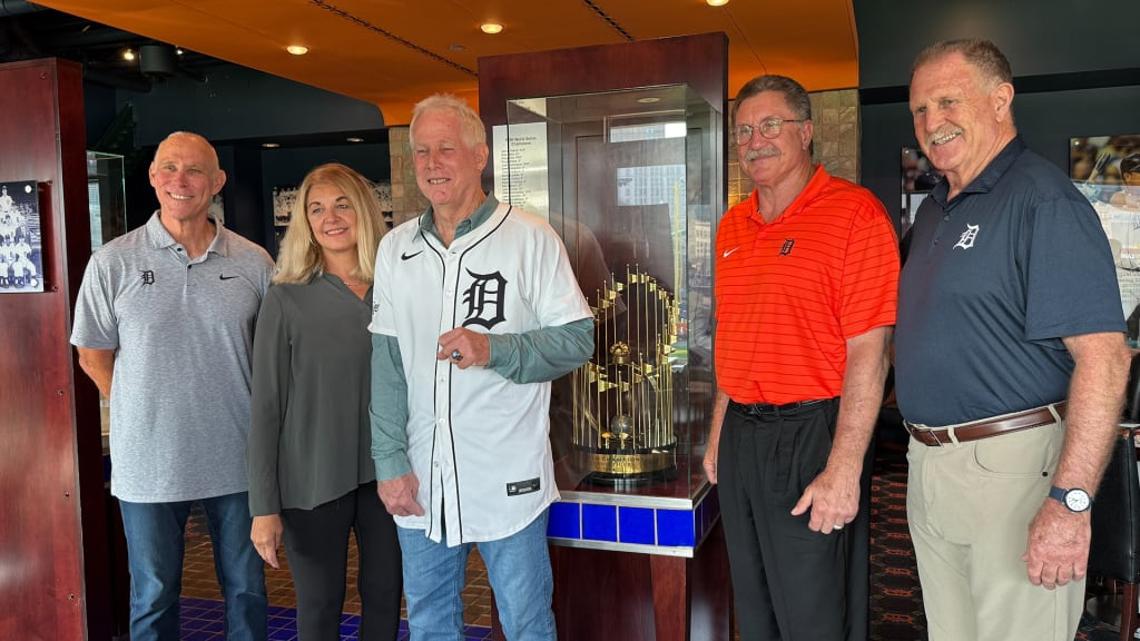 Randy O'Neal and his wife, Kathy, pose after O'Neal was presented with his 1984 World Series ring. Pictured with them are O'Neal's 1984 Tigers teammates. From left: Alan Trammell, Lance Parrish and Dan Petry.