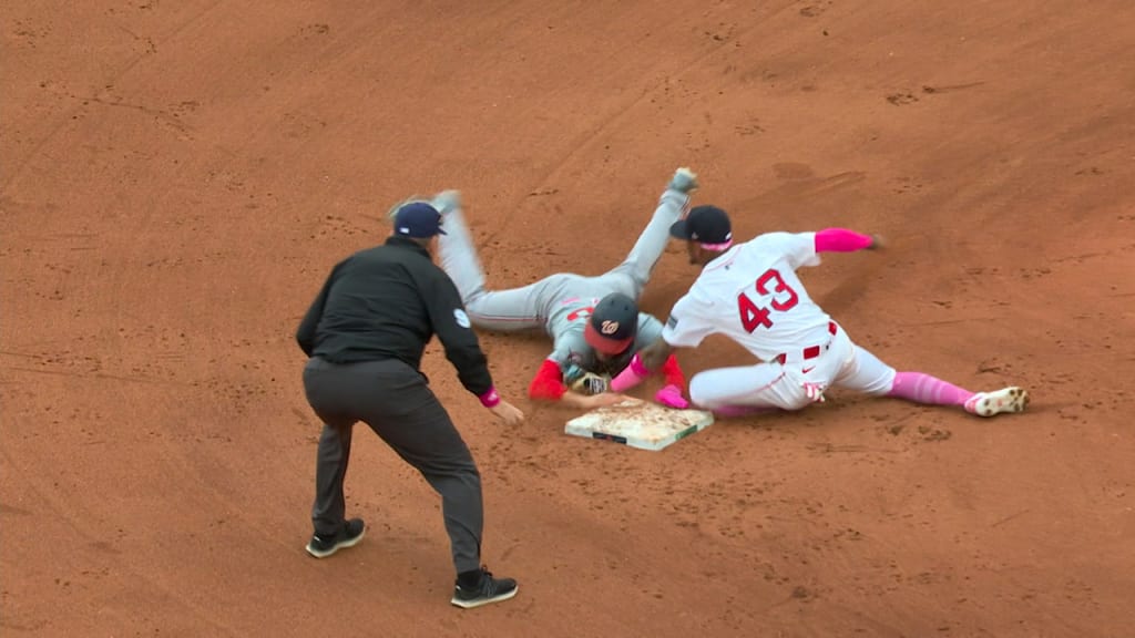 Wong nabs Young for the final out, call confirmed