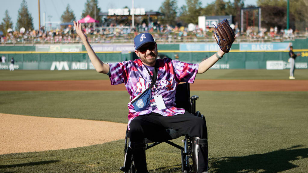 David Calvert is used to taking photos of first pitches. This time, he was on the other side of the lens.
