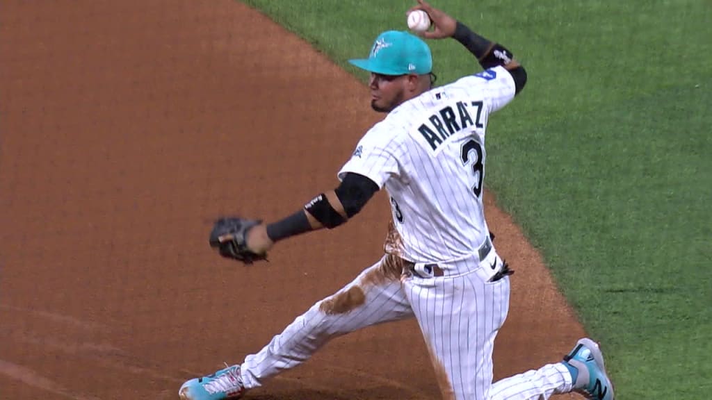 Marlins lose opener to Brewers, narrowly avoid shutout