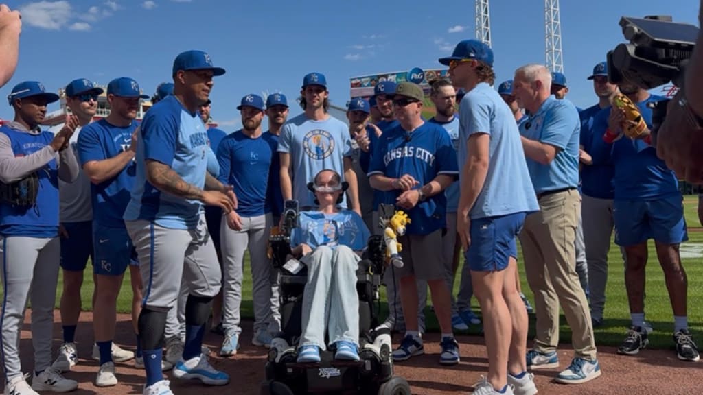 The Royals greet superfan Sarah Nauser ahead of their game against the Reds. (photo via Mike Petraglia)