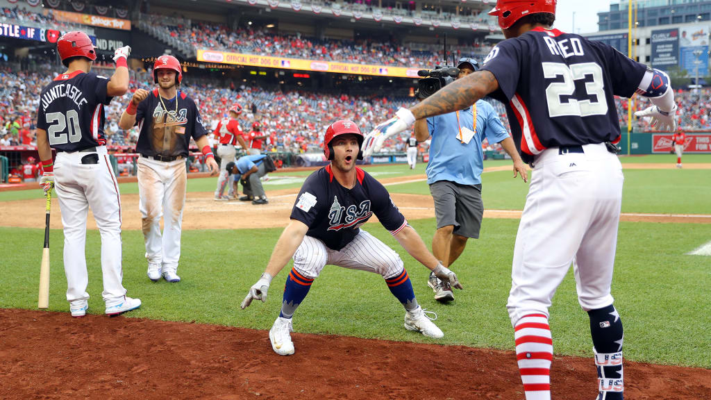 Pete Alonso celebrates with teammates after hitting a home run at the 2018 SiriusXM All-Star Futures Game at Nationals Park. (Alex Trautwig/MLB via Getty Images)
