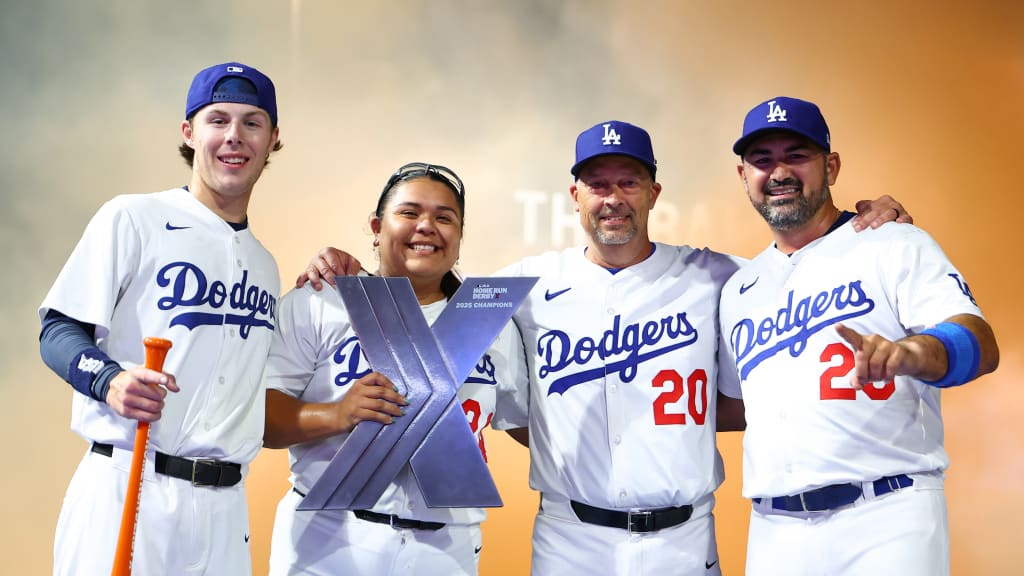 The Dodgers -- Grady Emerson, Mya Perez, BP pitcher Jay Stott, and Adrián González celebrate the HRDX victory.
