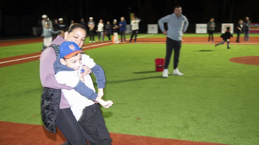 Todd Frazier pitches at The RWJBarnabas Health Field of Dreams