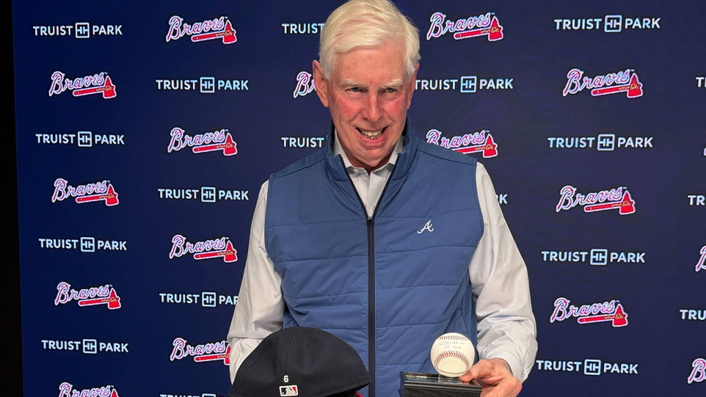 Terry McGuirk displays the ball assumed to be the last Bobby Cox signed before having a stroke in April 2019. (Mark Bowman/MLB.com)
