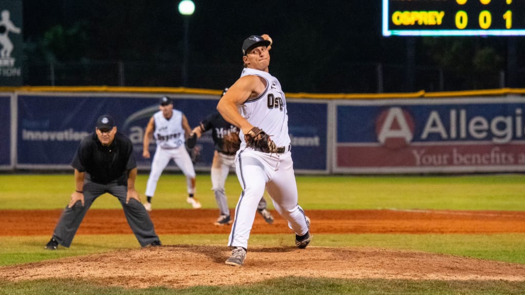Zach Penrod pitches in short sleeves in Missoula, Mont., during the 2023 season.