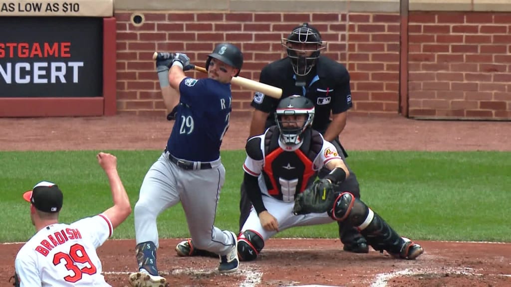 BALTIMORE, MD - June 24: Seattle Mariners catcher Cal Raleigh (29) tosses a  ball out of play during the Seattle Mariners versus the Baltimore Orioles  on June 24, 2023 at Oriole Park