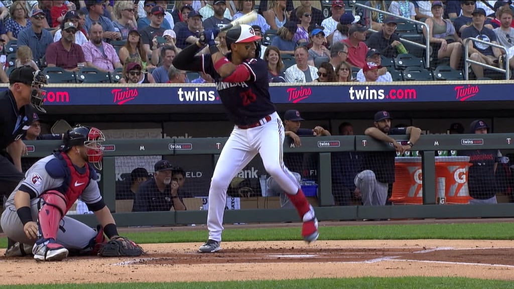 Minnesota Twins - Kyle Farmer smiles in the dugout