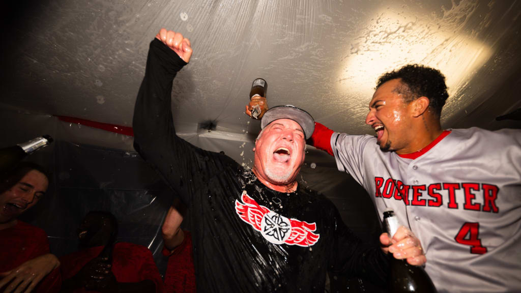 Red Wings manager Matt LeCroy celebrates his team’s championship victory.