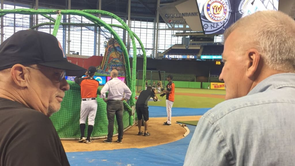 Perry Hill (left) chats with Alan Luckie prior to a game during Hill's third stint with the Marlins, while Luckie was a coach at South Alabama.
