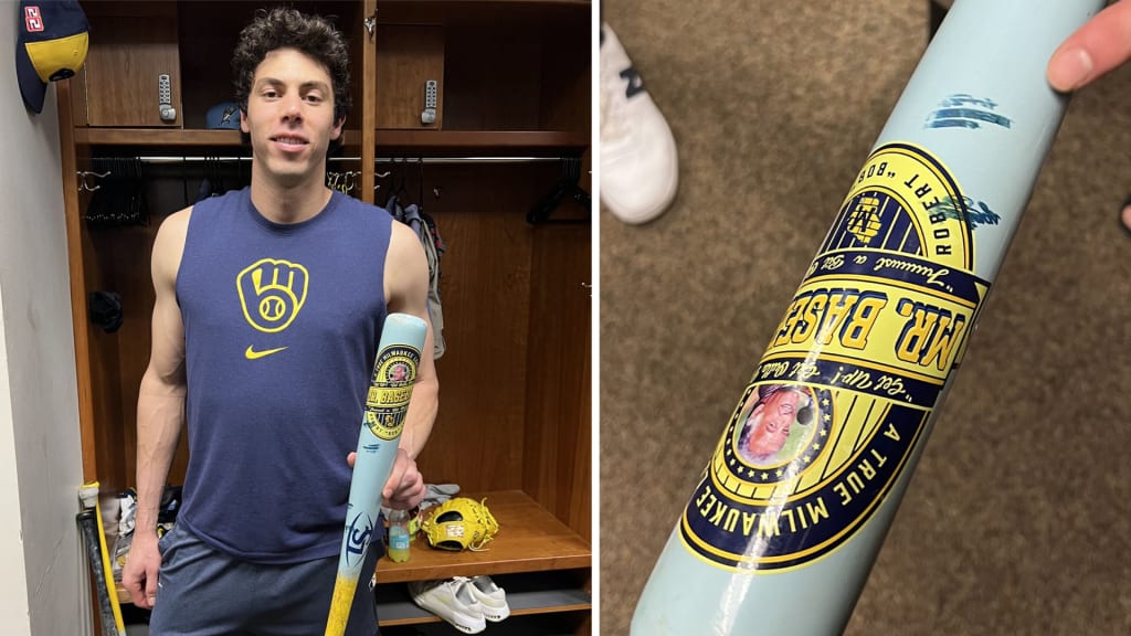 Yelich with his custom Bob Uecker bat (left), and the mark which was created by his first home run