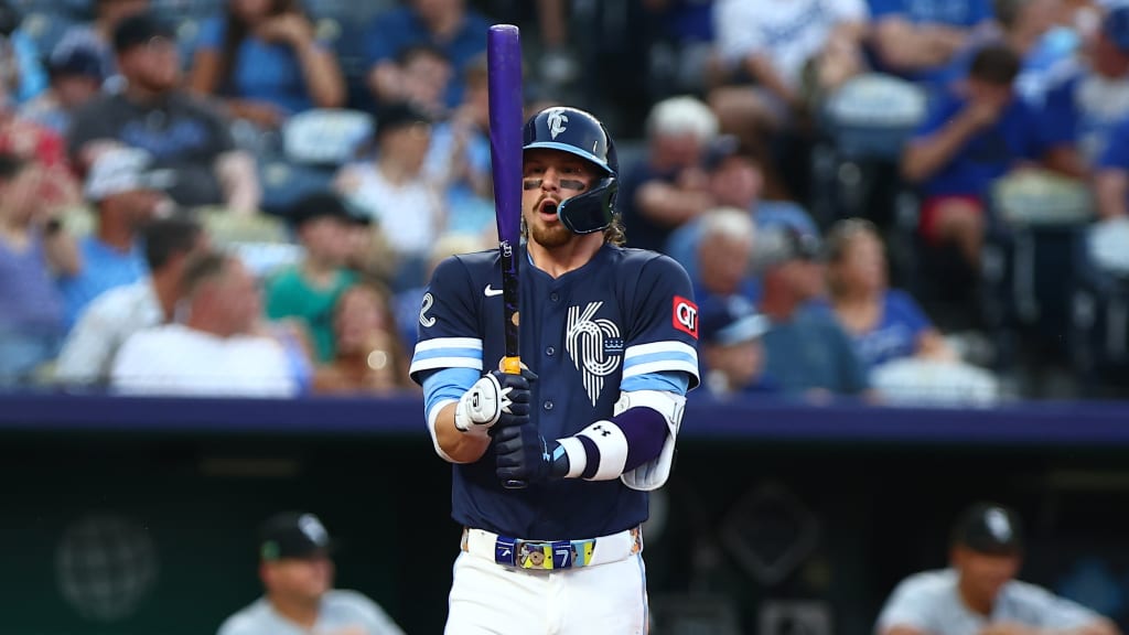 Bobby Witt Jr. uses a purple bat to honor the late Scott Pucino during Friday's win vs. the White Sox. (Jason Hanna/Royals)