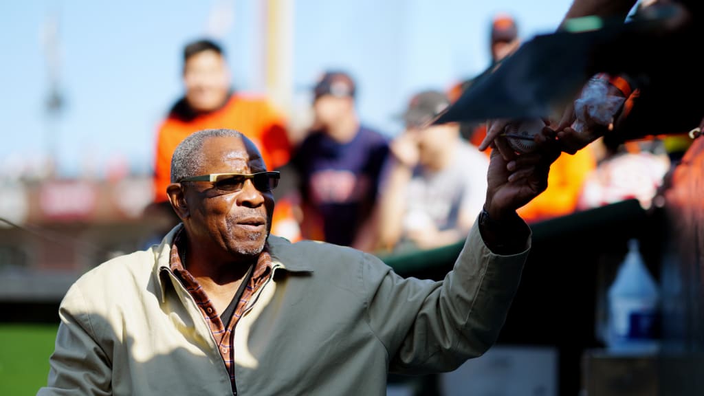 Dusty Baker signs autographs before a 2021 game at Oracle Park.