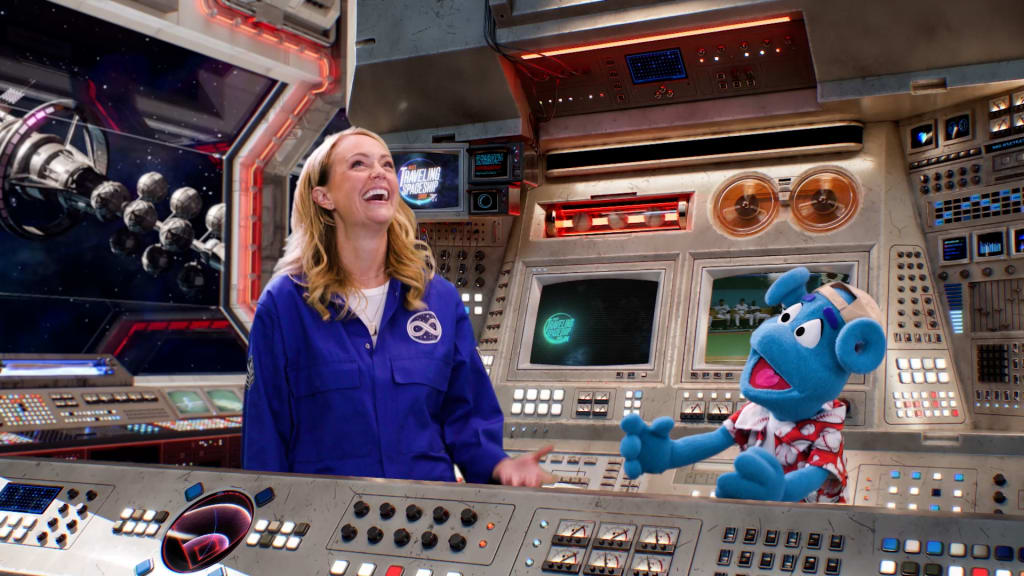 Sarah Tiana with her puppet sidekick Jax on "MLB's Traveling Spaceship Show."