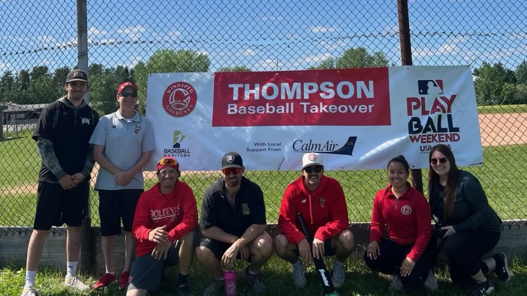 Staff and players of the Goldeyes at Red Sangster Ball Field in Manitoba. (Photo via Winnipeg Goldeyes)