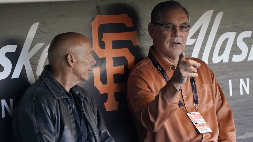 Flannery and Bochy catching up in early 2022, when both were retired from coaching. Credit: Jeff Chiu/AP