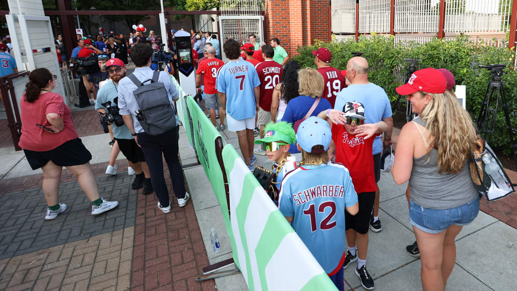 Phillies fans use the Go-Ahead Entry lane at Citizens Bank Park on Monday night.