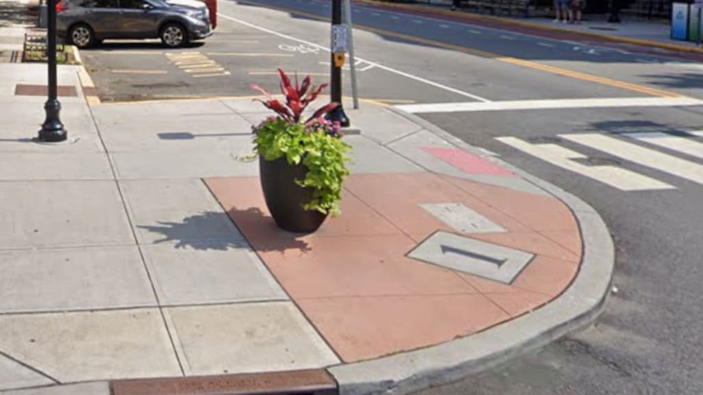 Street view of one of the four corners of Washington and 11th Streets in Hoboken, New Jersey, via Google Maps