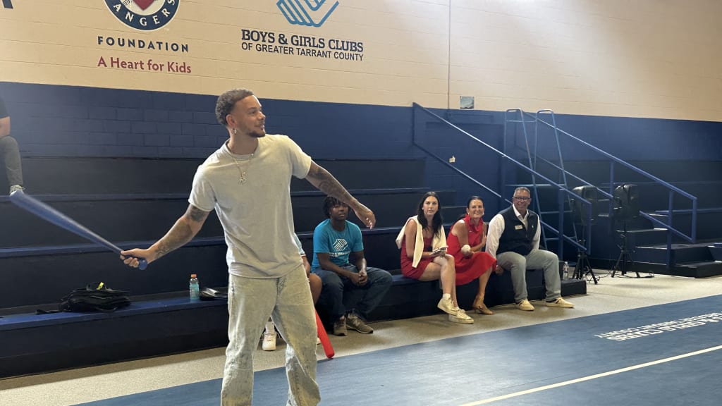 Kane Brown plays Wiffle Ball on the new court.
