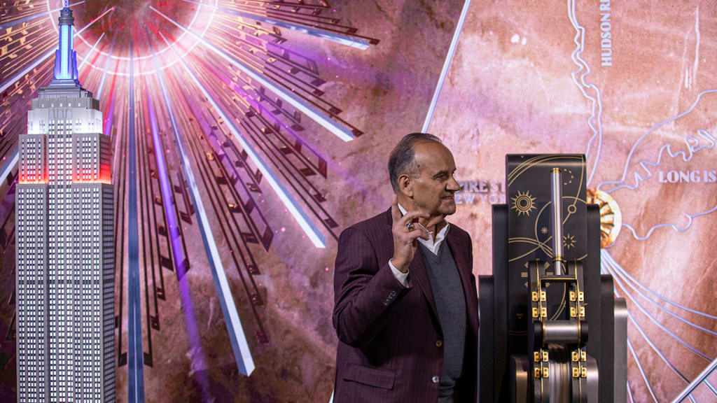 Joe Torre pulls the lever to light the Empire State Building during the Team USA Lighting Ceremony.