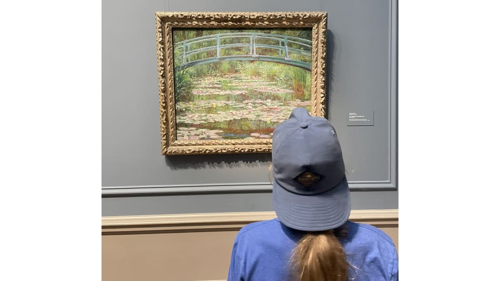 Emerson Schaeffer examines artwork by French painter Claude Monet