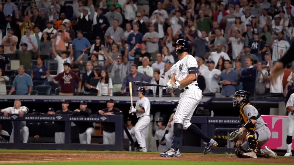 New York Yankees' Giancarlo Stanton walks to the dugout after