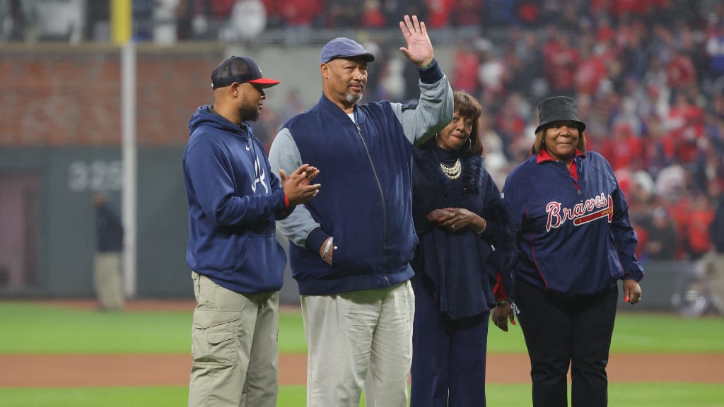 Siblings Lary, Gaile, Dorinda and Hank Aaron Jr., throw out the ceremonial first pitch prior to Game Three of the 2021 World Series between the Houston Astros and the Atlanta Braves.