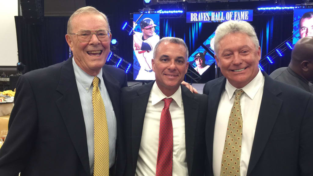 From left to right: Paul Snyder, Dayton Moore and Roy Clark