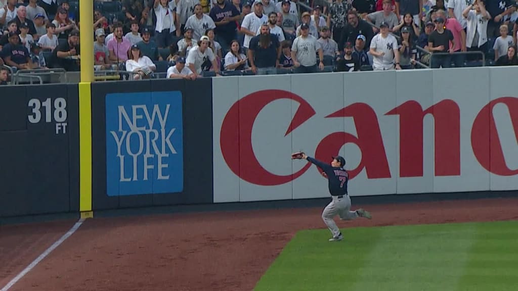 A Yankees fan was really happy to catch a Red Sox home run