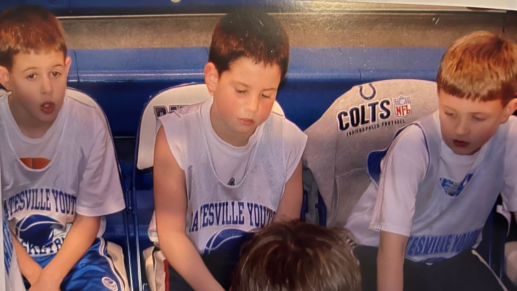 Hoeing, center, listening to coach mom circa 2005