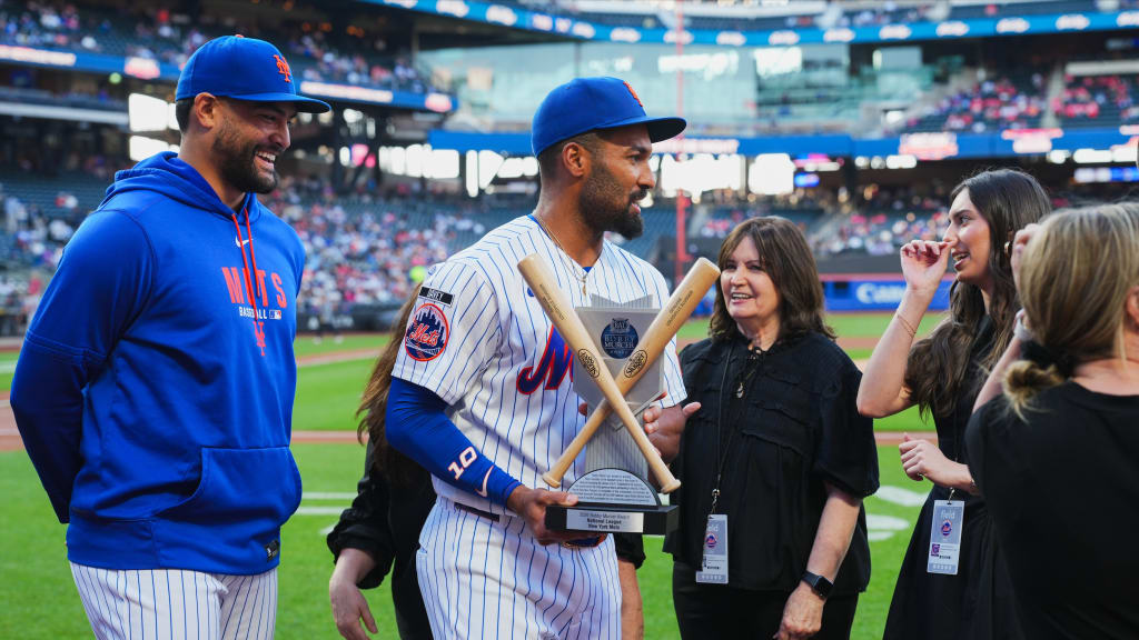 Sean Manaea and Marcus Semien receive the Bobby Murcer Award. (Evan Yu/MLB)