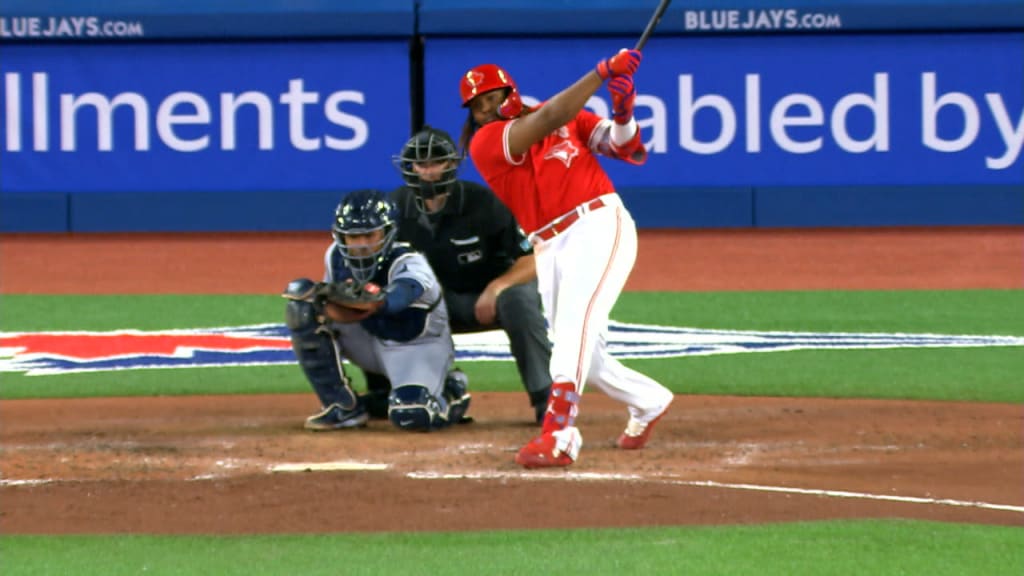 American League's Bo Bichette, of the Toronto Blue Jays, puts down his  glove in between innings during the MLB All-Star baseball game against the  National League in Seattle, Tuesday, July 11, 2023. (