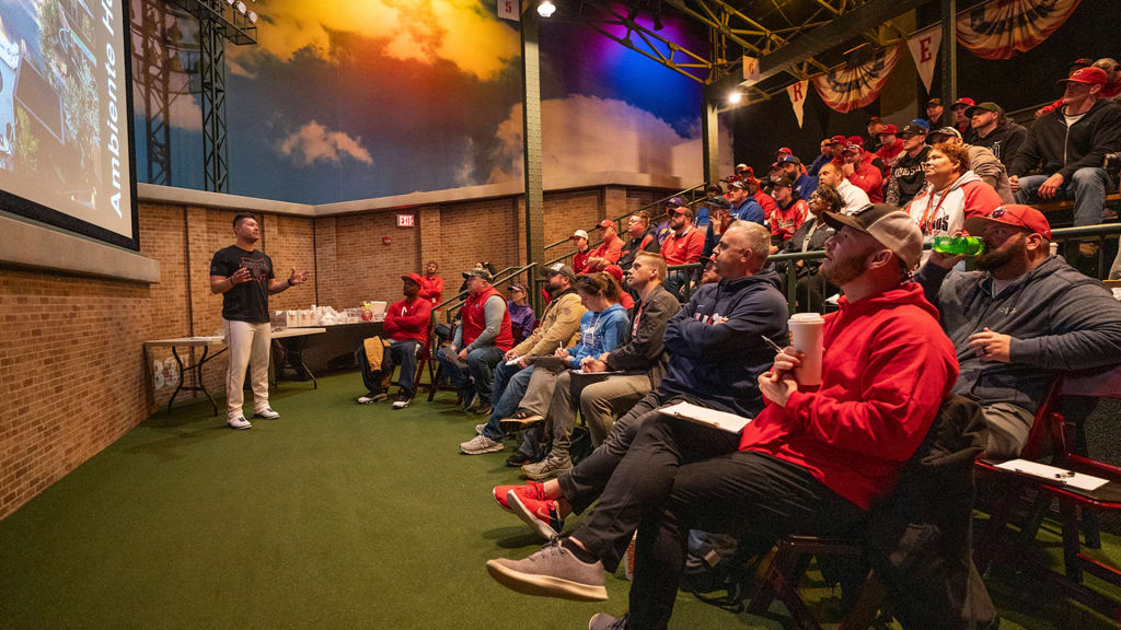 Third-base coach J.R. House, who was a scholastic star in baseball and football, speaks to local youth coaches.