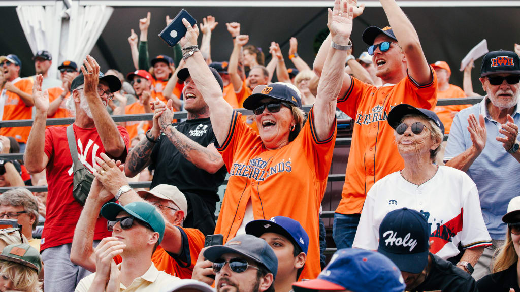 Fans cheer at Pim Mulier Stadium in Haarlem. Photo by @linedrivecaptures.