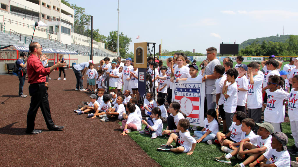 Hall of Fame president Josh Rawitch speaks to PLAY BALL participants about Larry Doby. (Dan Cichalski/MLB.com)