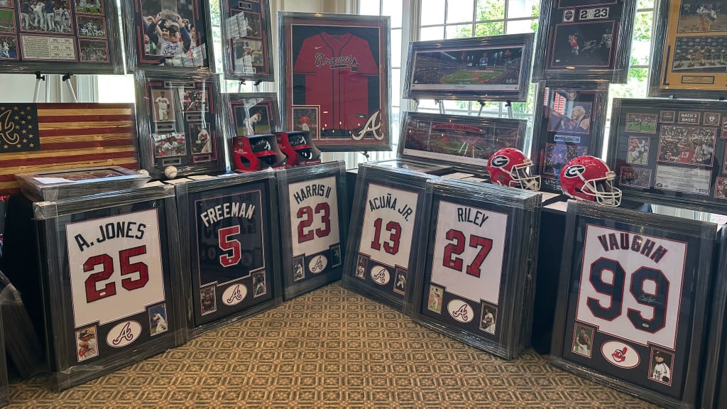 There was a lot of Braves memorabilia up for auction after the tournament. (Derrian Carter/MLB.com)