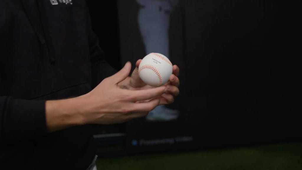 Ferrabee shows the specially designed ball used by Trajekt