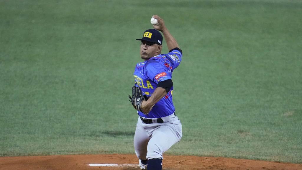 David Ramos gave up six runs in one-plus inning, but Venezuela battled back. (Ariana Cubillos/AP)