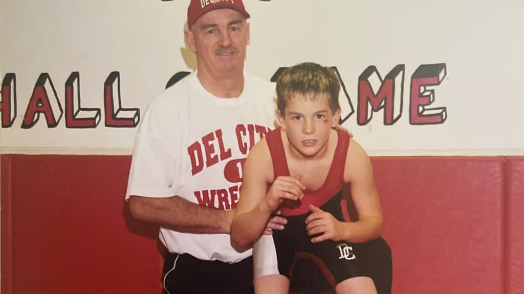 J.T. Realmuto with his dad, David, at wrestling practice (Photo credit: Ryan Realmuto)