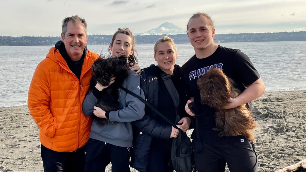 Mariners broadcaster Angie Mentink with her family