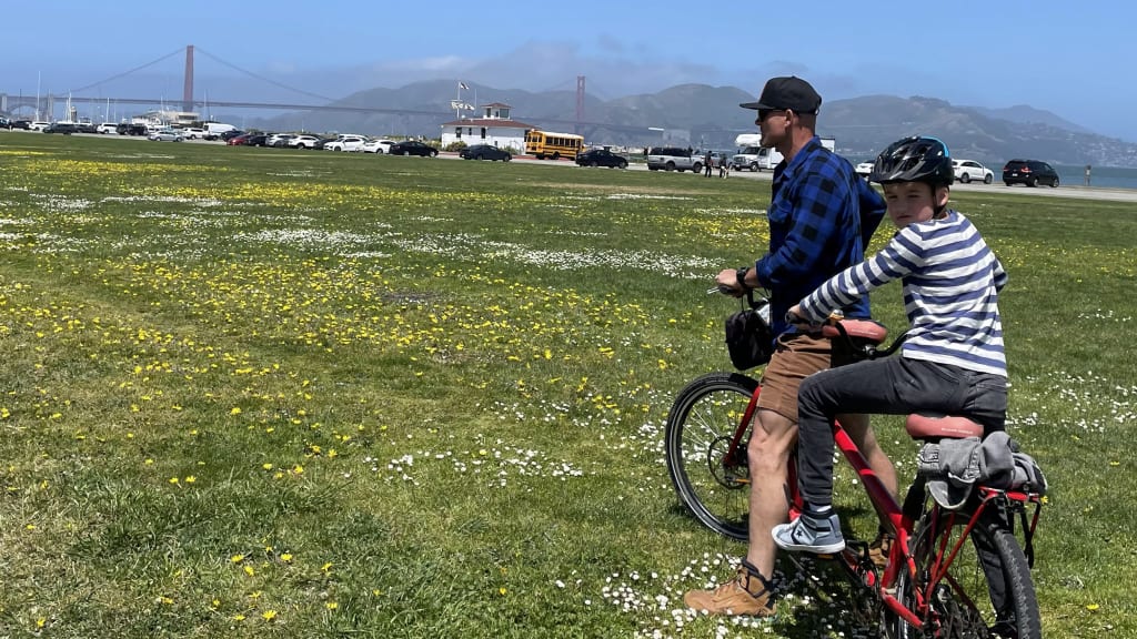Warren Schaeffer and son Beauman prepare to bike the Golden Gate Bridge