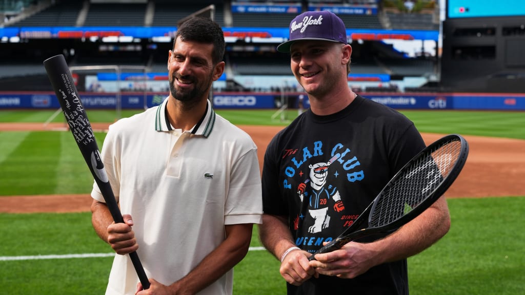 Novak Djokovic and Pete Alonso pose with their signed gear. (photo via Evan Yu)