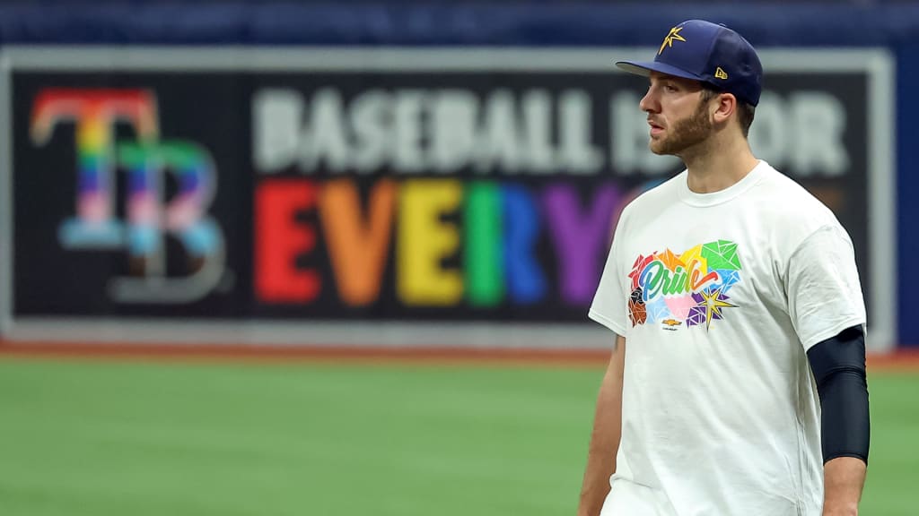 Reliever Colin Poche warms up prior to the Rays' Pride Night game vs. the Rangers